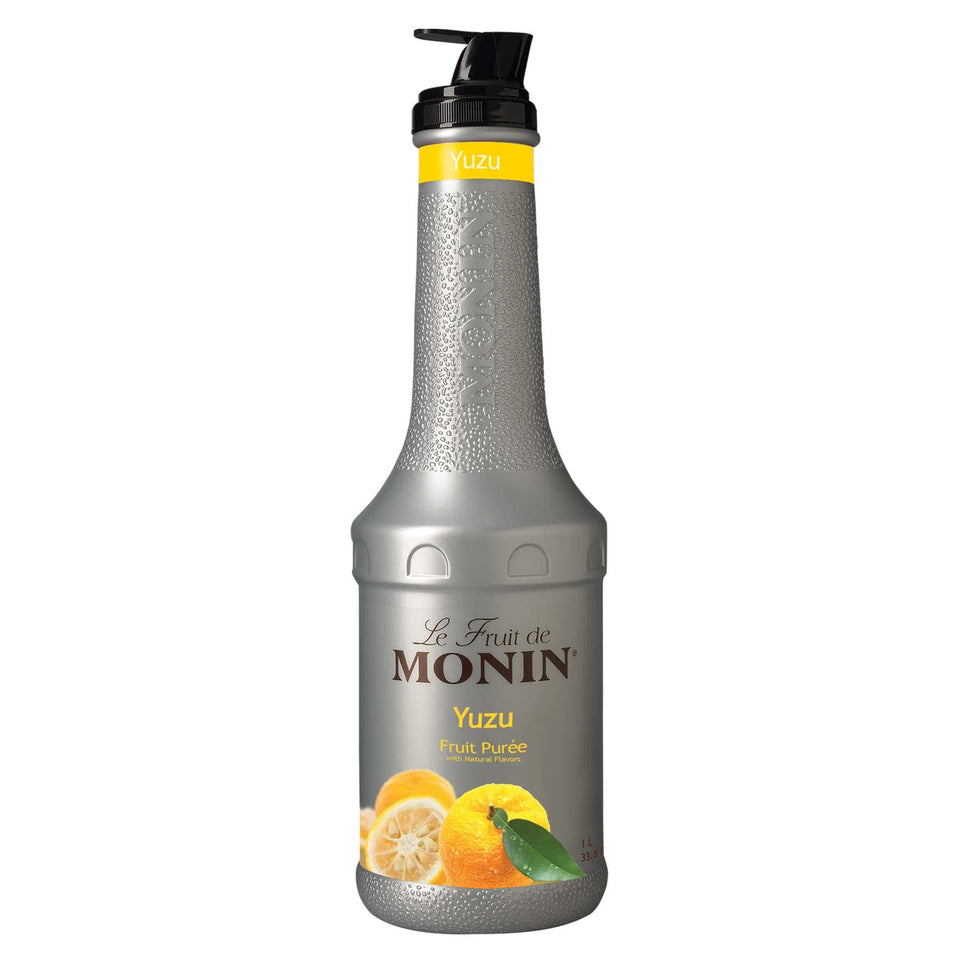 Monin Yuzu Purée bottle with a bright orange hue, ready for vibrant cocktails.