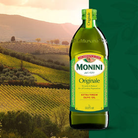 Monini olive oil on fresh salad for light finishing.