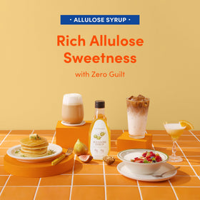 MONKSHUSHU Allulose Syrup glass with dessert showcases baking versatility