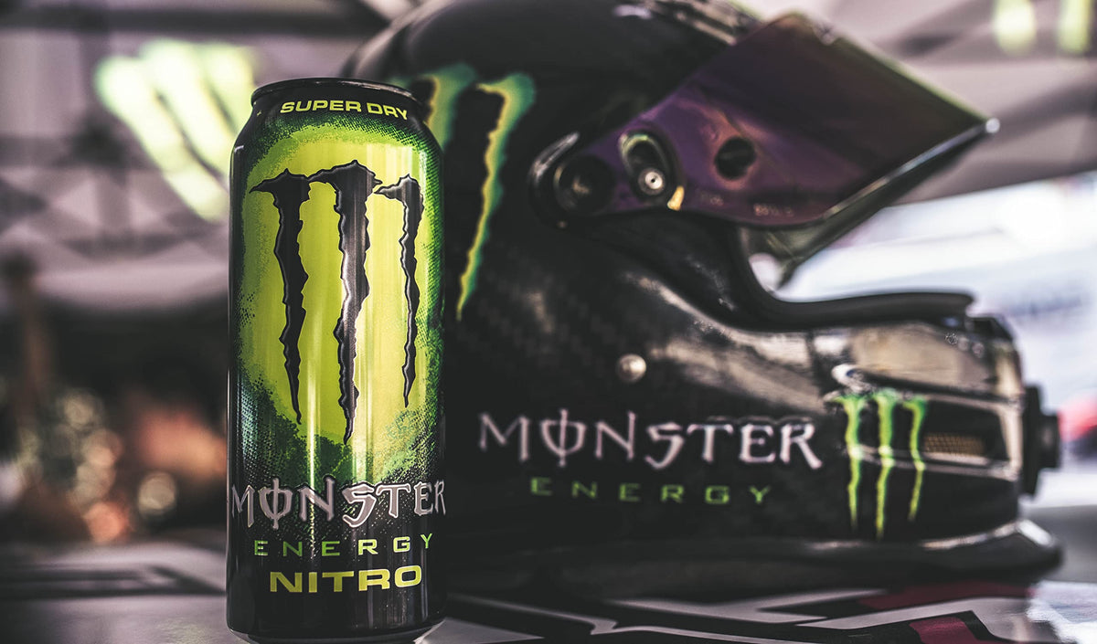 Monster Energy Nitro Super Dry citrus flavor visual with golden hue and zest