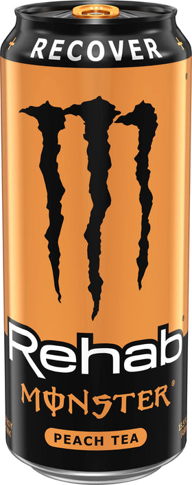 Pouring Monster Rehab Peach Tea Energy for a quick energy lift.
