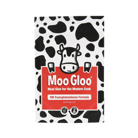 Moo Gloo Transglutaminase bottle demonstrates precise binding for clean protein seams.