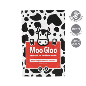 Moo Gloo Transglutaminase powder packaging highlights dry application for consistent binding.