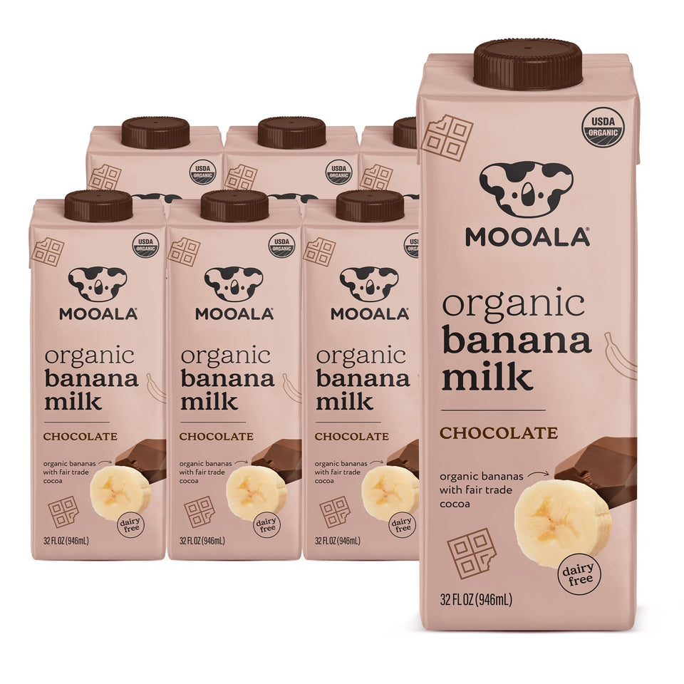 Mooala Chocolate Banana Milk carton pack on a shelf, pantry-stable non-dairy option.
