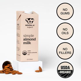 Mooala Simple Almond Milk pour into coffee for a dairy-free latte