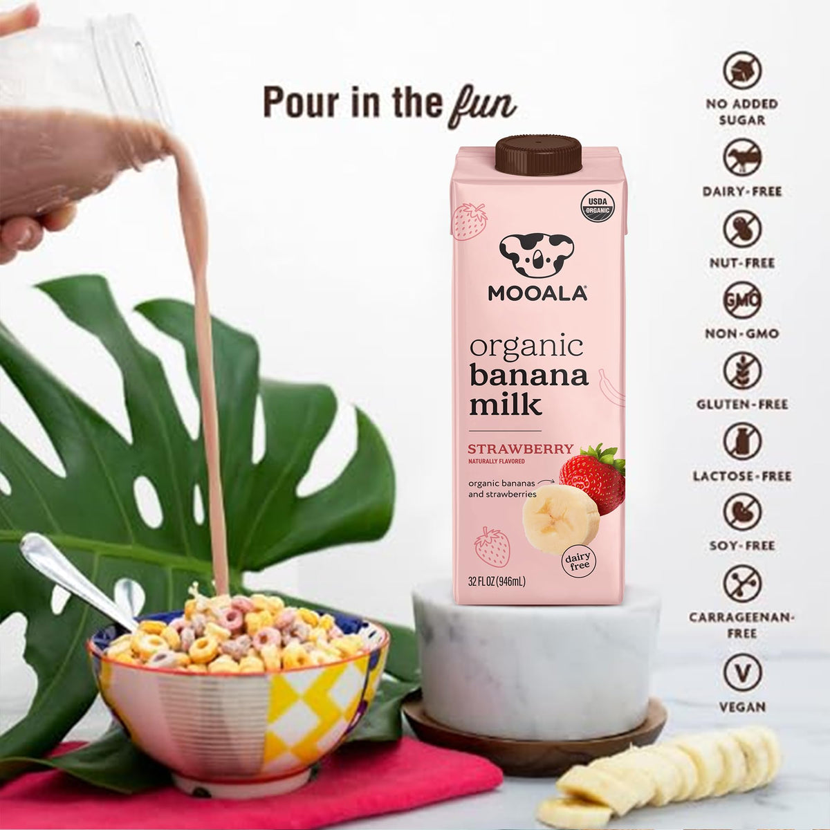 Mooala Strawberry Banana Milk with cereal bowl; versatile breakfast addition.