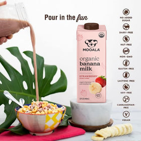 Mooala Strawberry Banana Milk with cereal bowl; versatile breakfast addition.