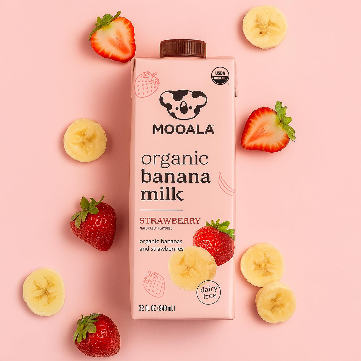 Mooala Strawberry Banana Milk being poured into a glass; ready-to-drink convenience.