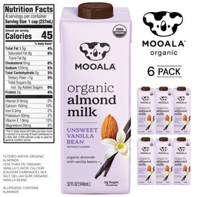 Mooala vanilla bean almond milk being poured into a glass