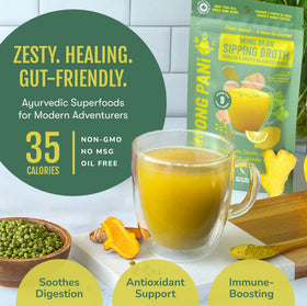 Moong Pani ginger lemon turmeric broth close-up highlights warm spice blend.