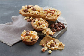 Premium popcorn tins by Moose Munch, elegant packaging for gifting or display