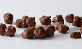 Moose Munch Premium Popcorn Trio: milk chocolate variety enhances movie nights with a creamy crunch.