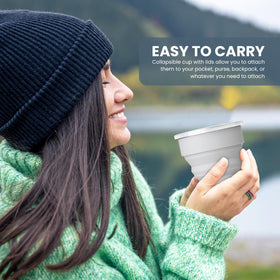 MORALZA collapsible cup folded flat, compact travel accessory.
