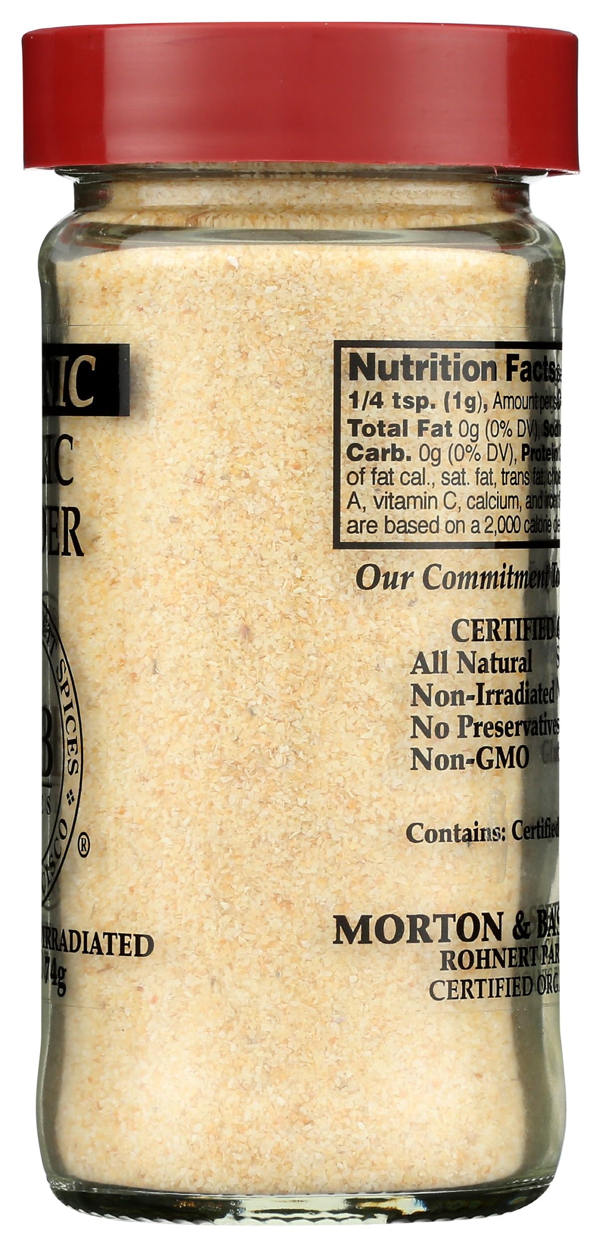 Morton & Bassett Organic Garlic Powder with spices on counter for quick seasoning.