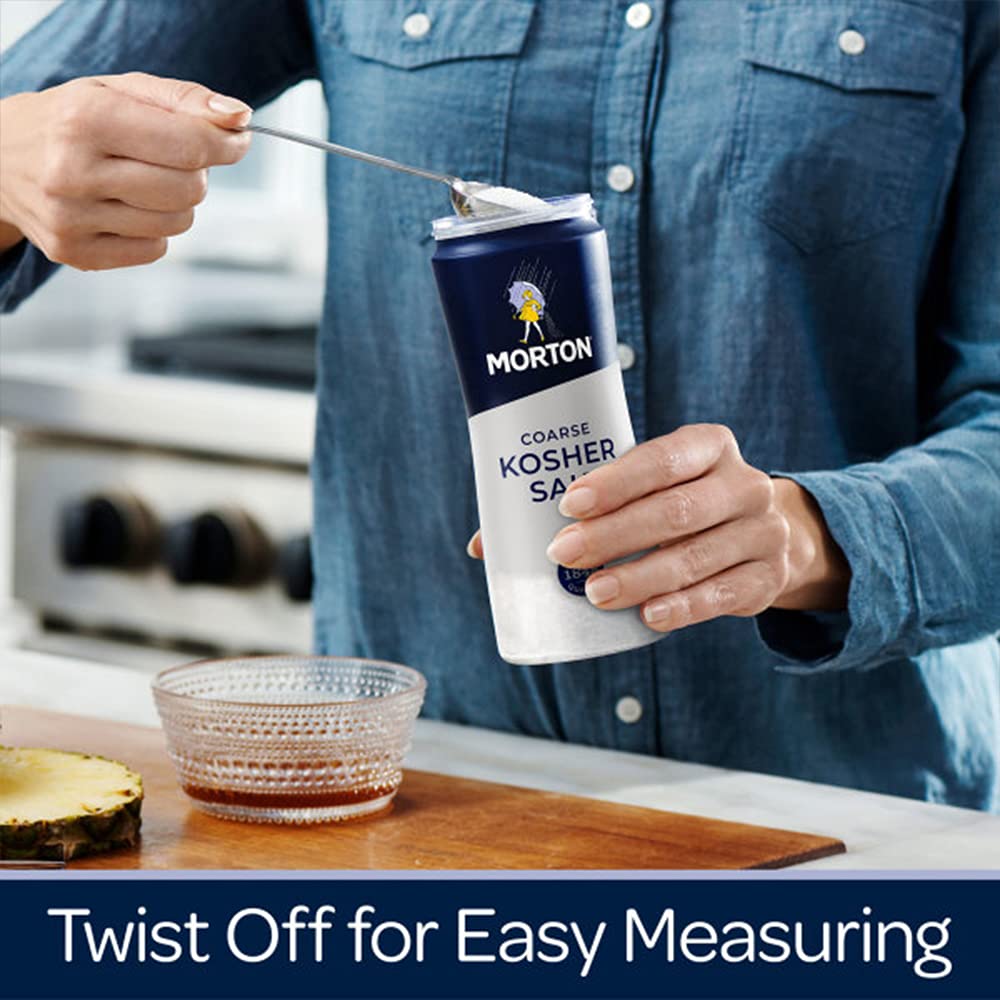 Morton Coarse Kosher Salt on counter beside spices for everyday cooking.