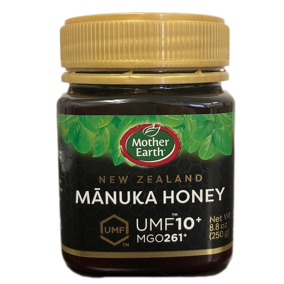 Mother Earth Manuka honey UMF10 jar on counter for daily wellness and flavor.