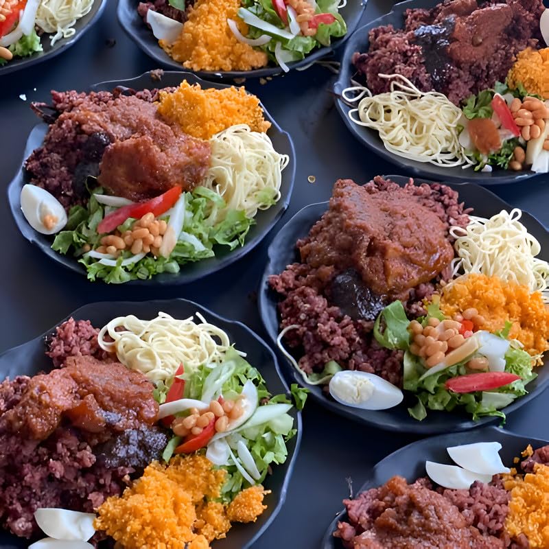 Motherland Goods waakye leaves cooked-dish presents a vibrant Ghanaian meal ready to serve.