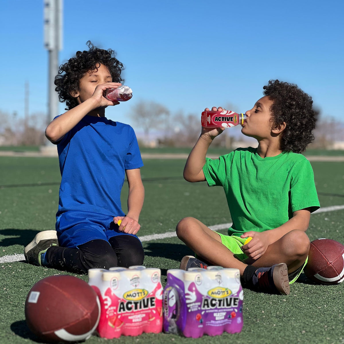 Kids enjoy Mott's Active Watermelon Burst during sports practice.