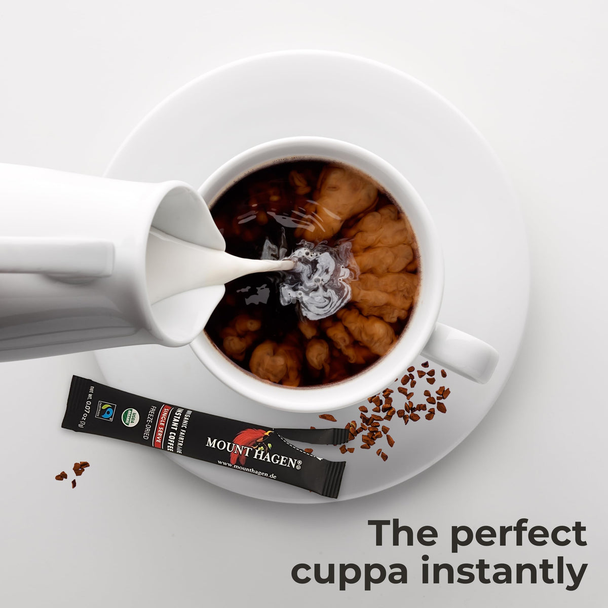 Mount Hagen instant coffee dissolving in cold water for easy iced coffee.