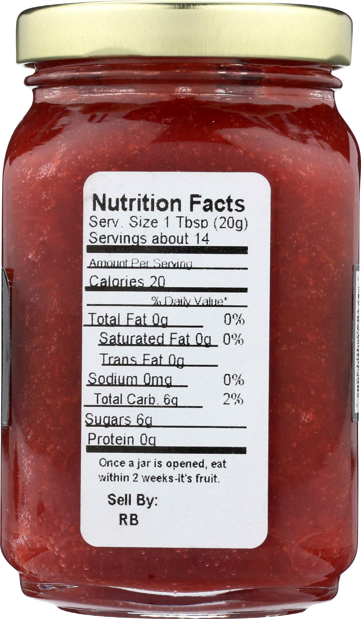 Mountain Fruit Co. Rhubarb Berry Jam bottle pour highlights smooth spreadability.