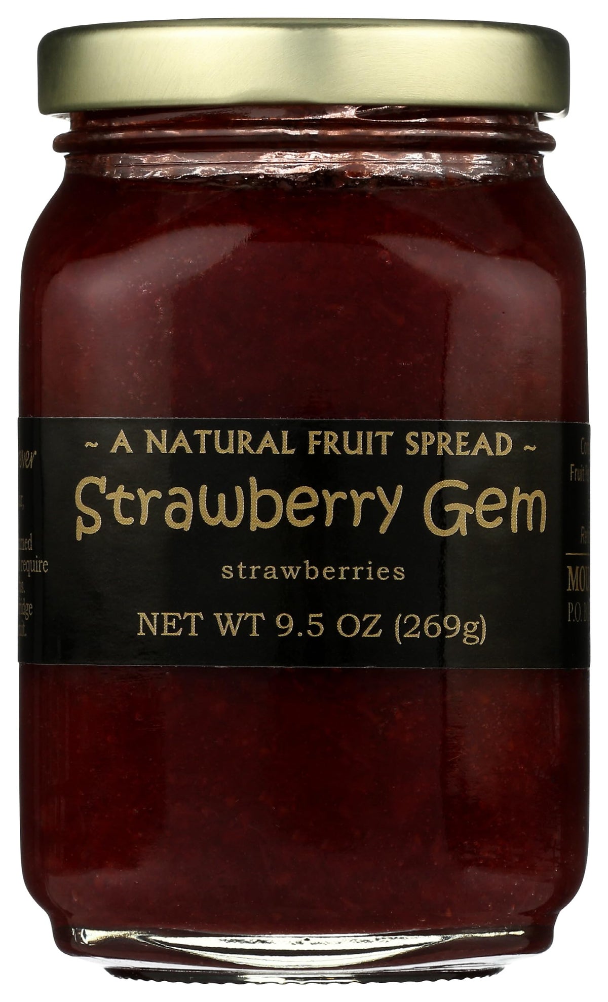 Mountain Fruit Co. strawberry jam jar close-up with visible real strawberry pieces.