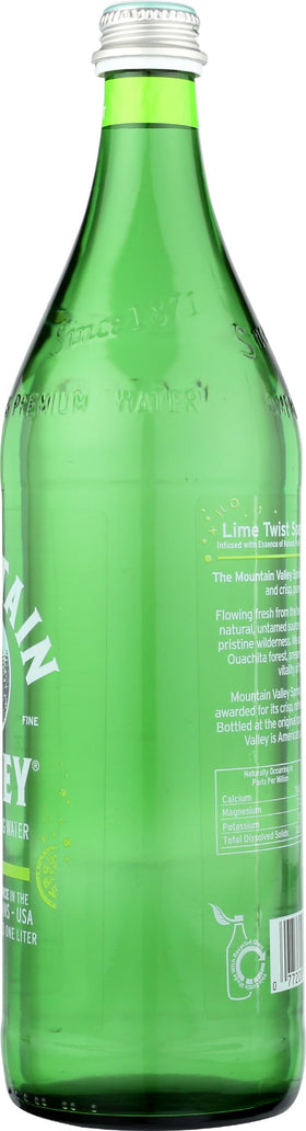 The Mountain Valley Sparkling Lime fizz close-up, vibrant citrus bubbles.