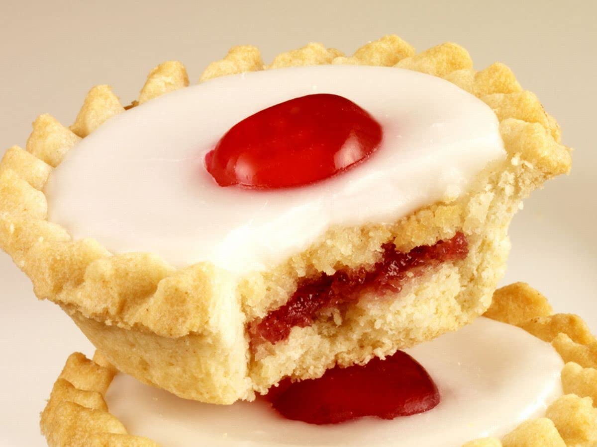 Mr Kipling Cherry Bakewells close-up, almond topping and cherry center.