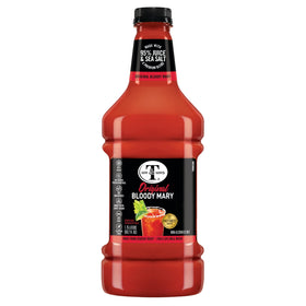 Pouring Mr & Mrs T Original Bloody Mary Mix into a glass for cocktails
