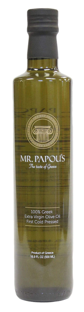 Mr. Papou's authentic Greek olive oil bottle on a kitchen counter, ideal for drizzle