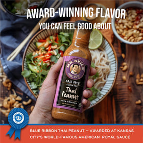 Pouring Mr. Spice salt-free peanut sauce over noodles for quick meals
