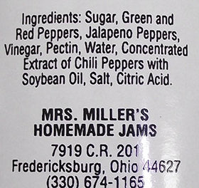 Glazing barbecue with Mrs. Miller's hot pepper jelly marinade.