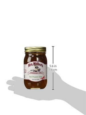 Pouring Mrs. Miller's hot pepper jelly for a glossy glaze.