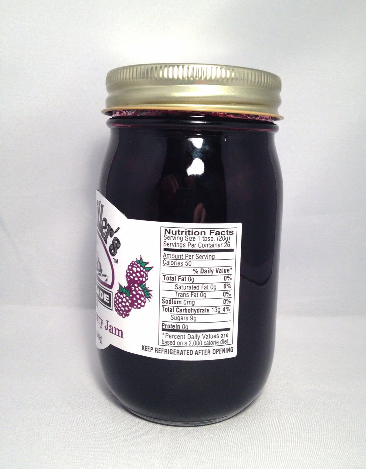 Jar label detail emphasizing homemade craftsmanship and natural color of seedless berry spread.