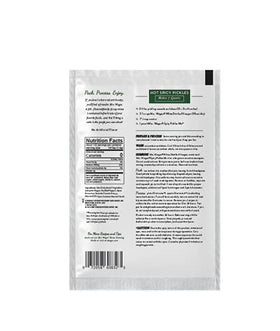 Mrs. Wages Hot Spicy Pickles Quick Process Mix finished pickles, crisp and boldly seasoned.