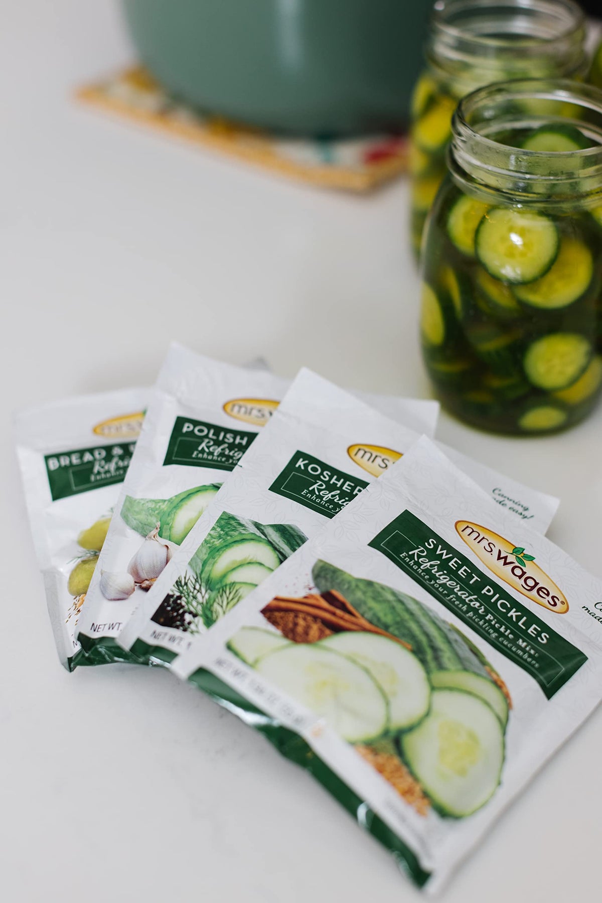 Mrs. Wages Kosher Dill Mix open pouch; quick prep with vinegar for tasty no-process pickles.