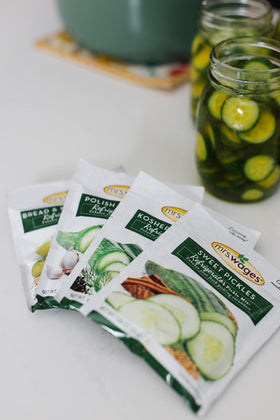 Mrs. Wages Kosher Dill Mix open pouch; quick prep with vinegar for tasty no-process pickles.