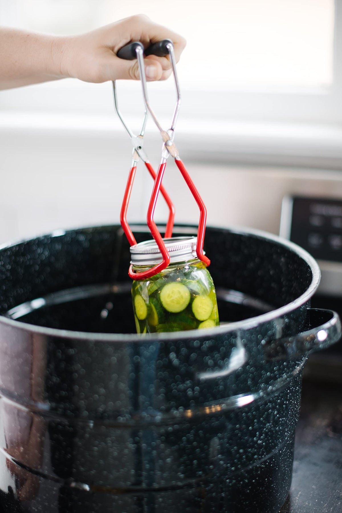 Mrs. Wages Kosher Dill Mix open pouch; supports easy, kosher pickling in your fridge.