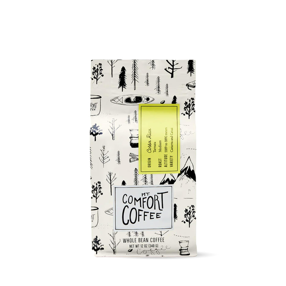 Mt. Comfort Coffee Costa Rica medium roast whole beans in bag, rich aroma ready for brewing.