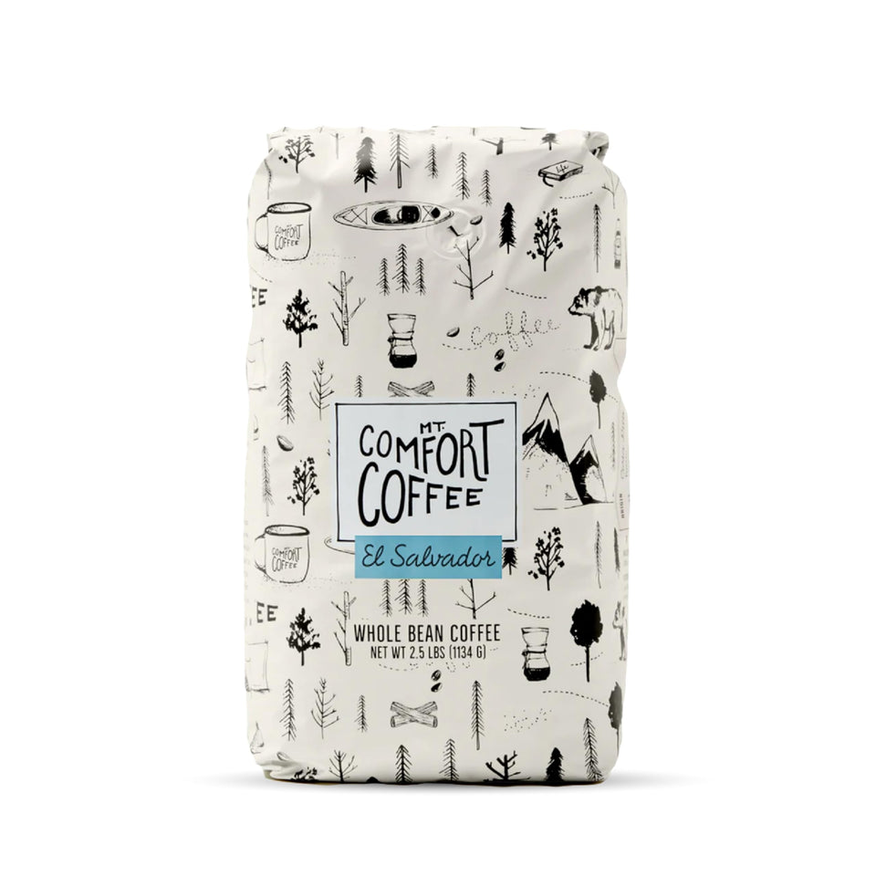 Mt. Comfort Coffee El Salvador Medium Roast bag on counter, emphasizing freshness and balance.