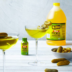Mt. Olive Pickle Juice 12-pack display for convenient on-the-go use.