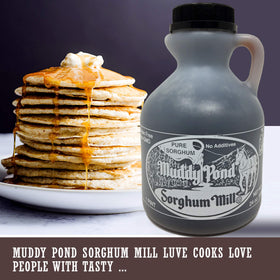 Muddy Pond Sorghum Mill grandchildren labeling jars to preserve tradition