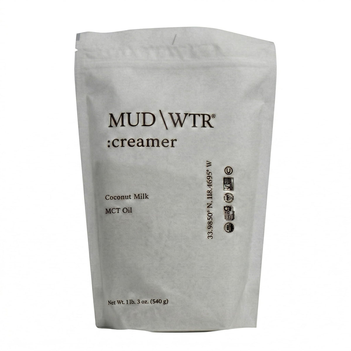 MUDWTR coconut creamer powder bottle for a creamy, dairy-free coffee option with MCT oil