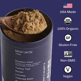 MUDWTR Rest measuring scoop next to powder for easy prep.