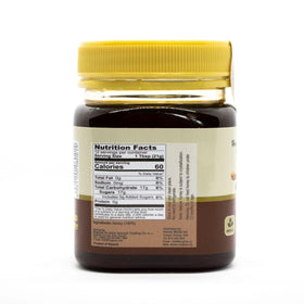 Mujeza Al Shifa black seed honey pour highlights smooth texture and aroma.