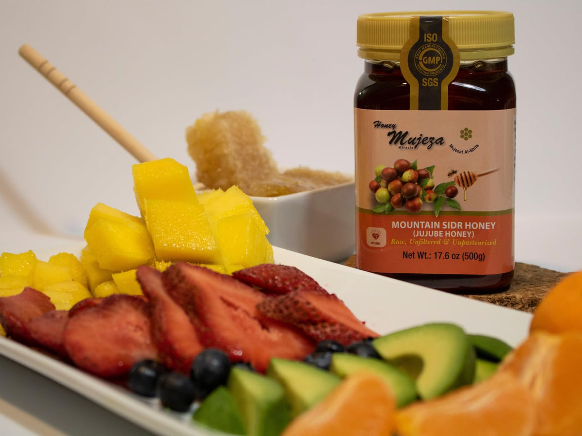 Mujeza Al Shifa honey glass bottle with warm glow for natural sweetness.
