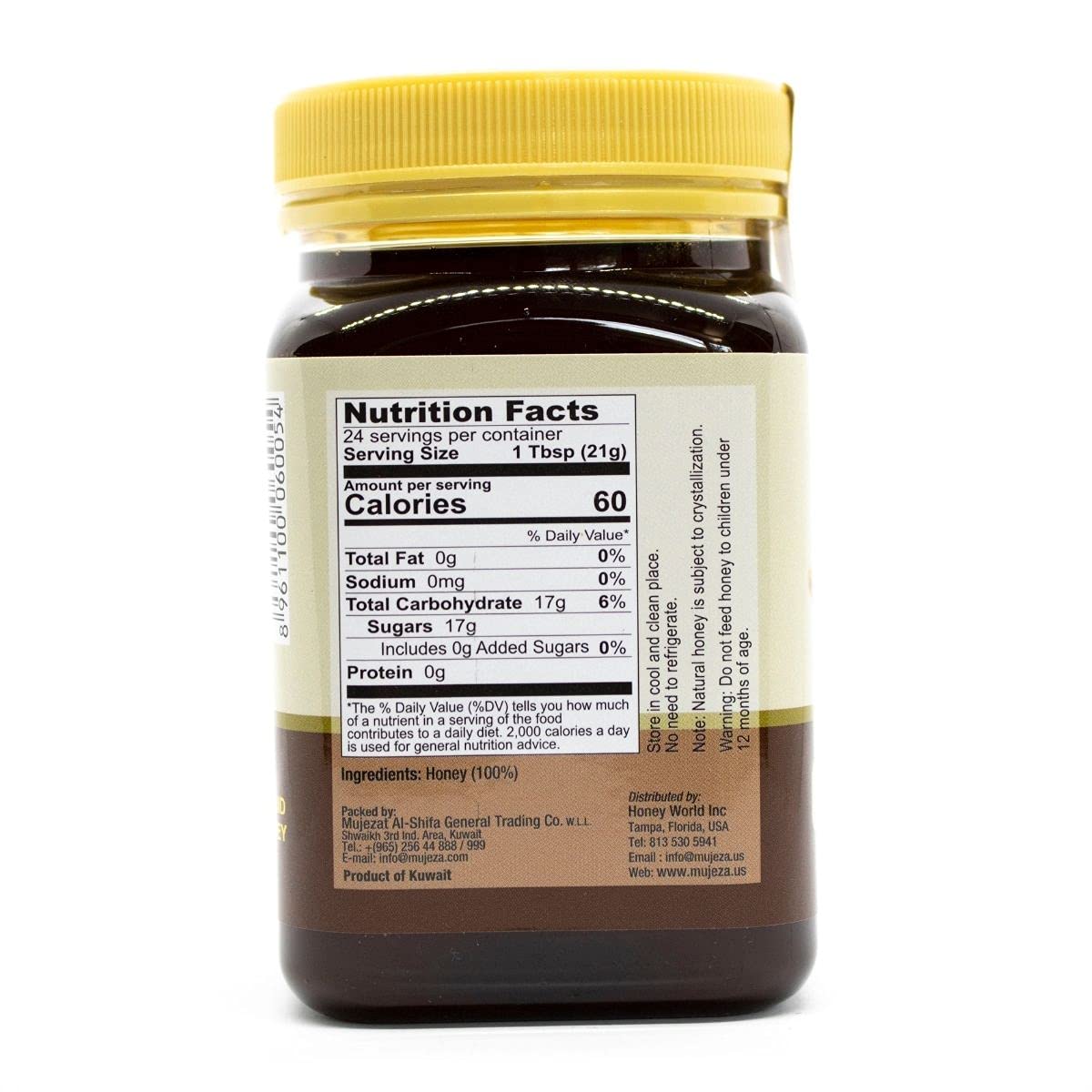 Mujeza Black Seed Honey bottle angled shot emphasizing rich color and premium, unfiltered honey.