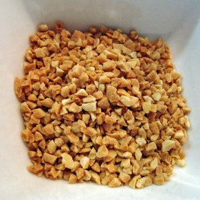 Mulberry Lane Farms chopped roasted peanuts on ice cream, adding crunch and nutty flavor.