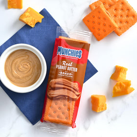 MUNCHIES sleeve shows 1.42 oz size and calories per pack.