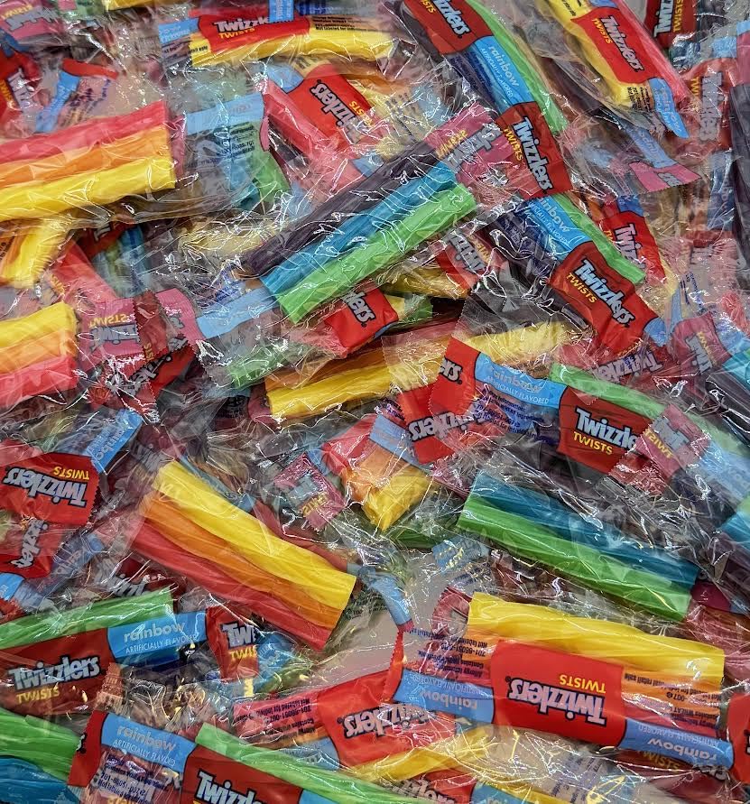 Munchique Rainbow Licorice Twists individually wrapped, ready for snacking or gifting.