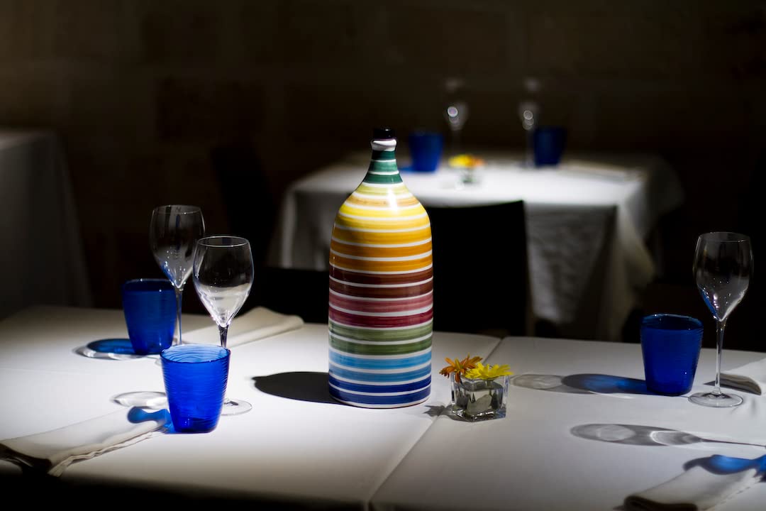 Muraglia rainbow bottle detail showing vivid colors and artisanal finish